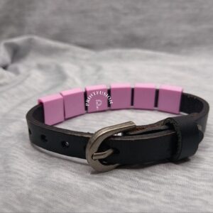 Armband schwarz mit pinken Steinchen